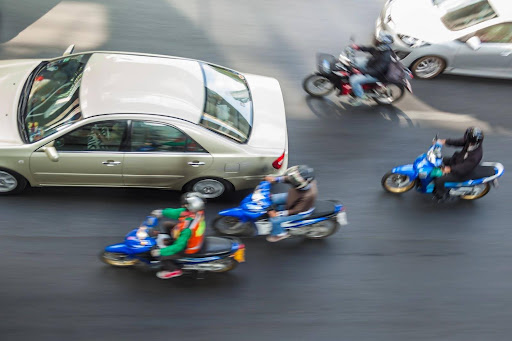 Motorcycle lane splitting is a practice that is often questioned for both safety and legality. Motorcycle lane splitting is a practice that is often questioned for both safety and legality.