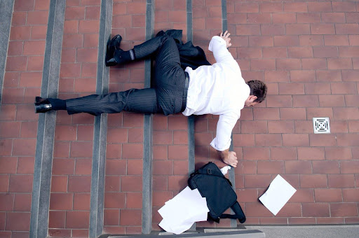 A man who has fallen down a flight of stairs; slip and fall cases can help injured victims recover damages. A man who has fallen down a flight of stairs; slip and fall cases can help injured victims recover damages.