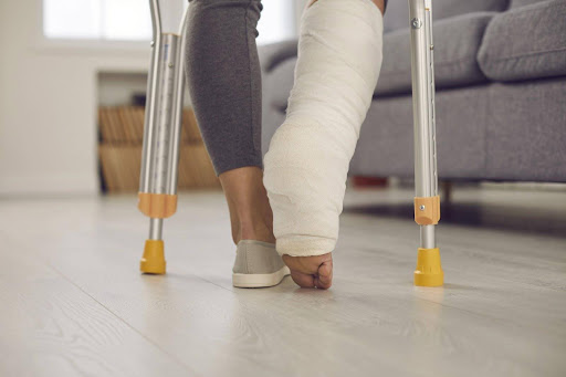 A woman with crutches and a plaster cast on one leg; mistakes after an accident could harm a personal injury claim. A woman with crutches and a plaster cast on one leg; mistakes after an accident could harm a personal injury claim.