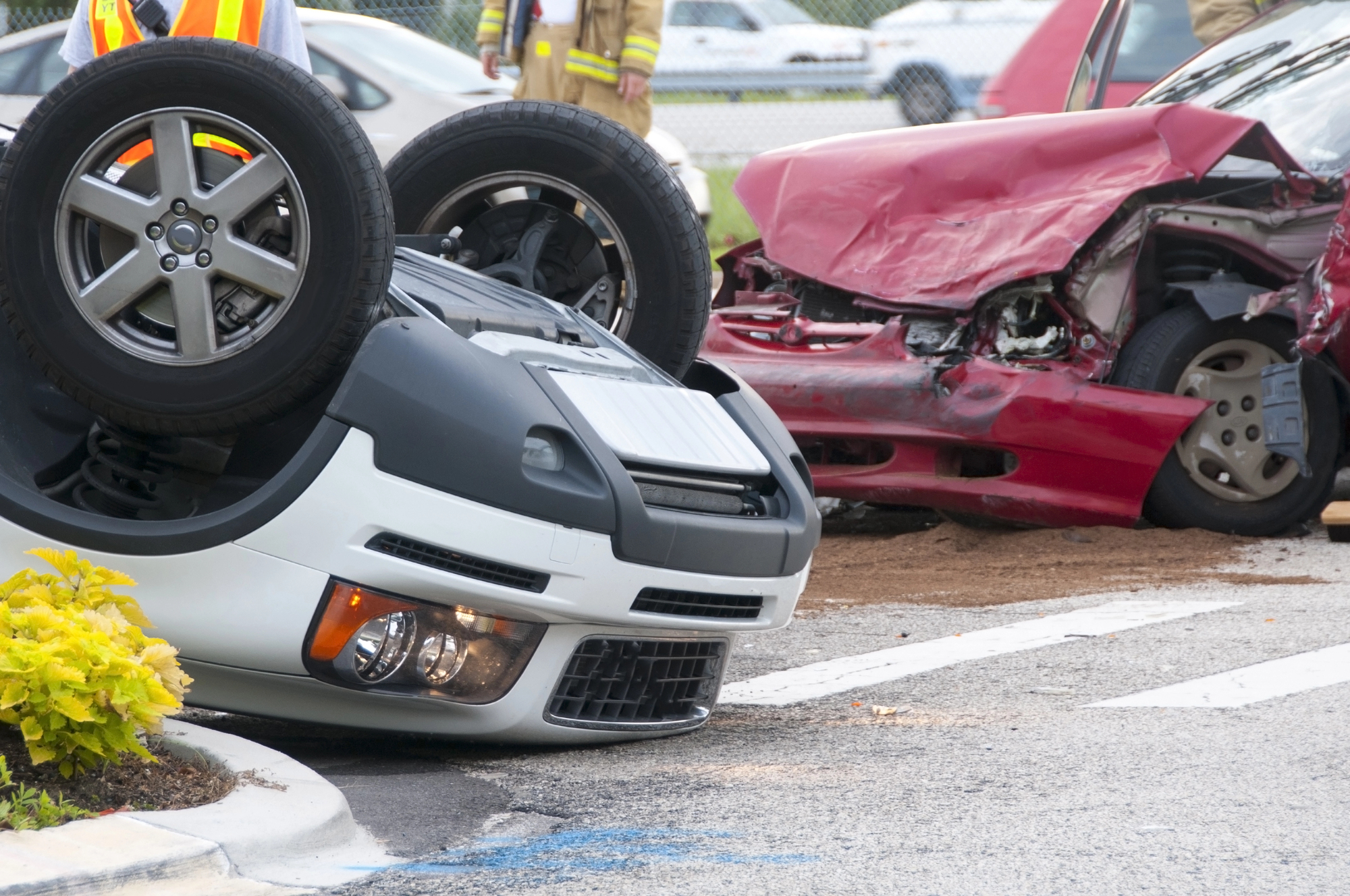 image1 Overturned vehicle and damaged car after a serious collision, illustrating the potential dangers of parking lot accidents and the importance of understanding liability and safety risks.